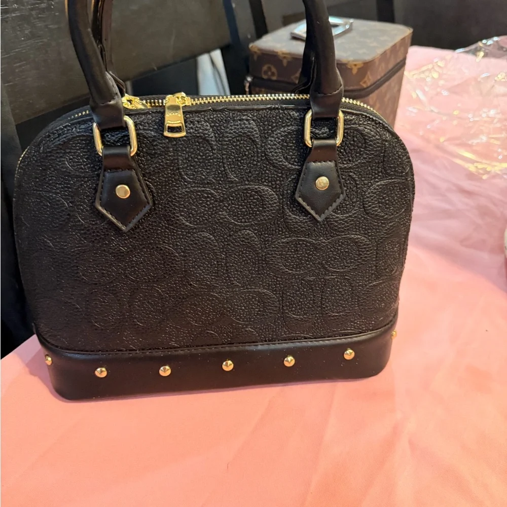 Elegant‎ Black Handbag with Gold Accents